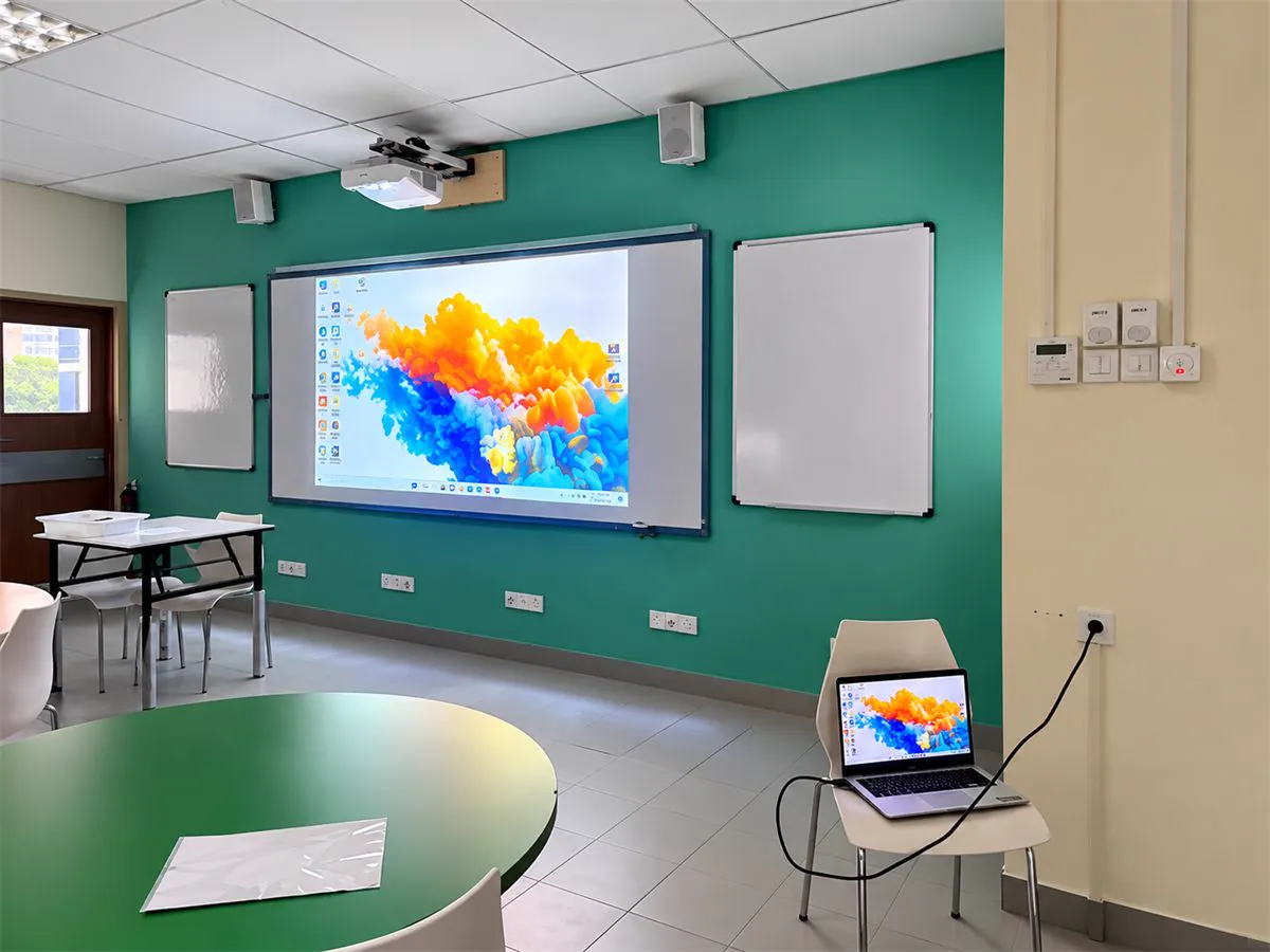 Nexus International School classroom with an interactive projector and ceiling speakers